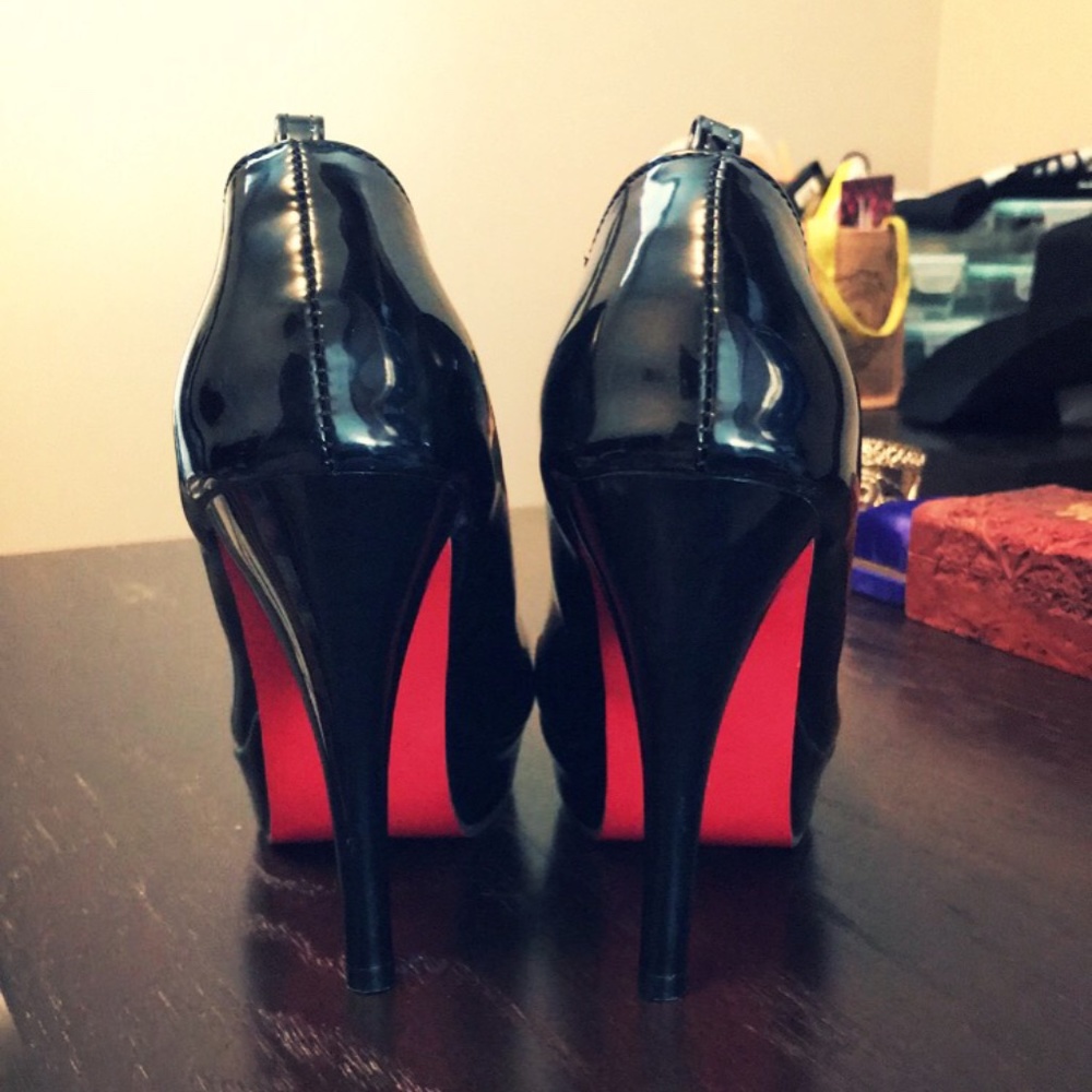 Red-bottomed Patent Black Platform Pumps
